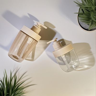 400ml 500ml প্রয়োজনীয় তেল, শ্যাম্পু এবং লোশনের জন্য প্রেস পাম্প সহ PET প্লাস্টিক কসমেটিক বোতল